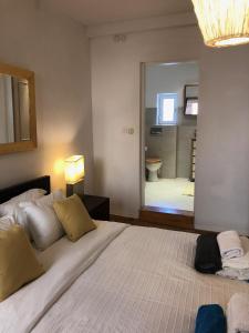 Łóżko lub łóżka w pokoju w obiekcie 5c Luxury Apartment Rovinj