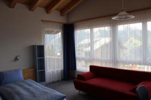 Svetainės erdvė apgyvendinimo įstaigoje Hotel Alpha
