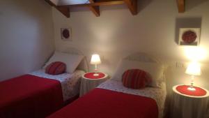 A bed or beds in a room at B&B LE MAGNOLIE