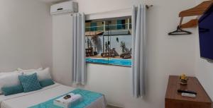 Postel nebo postele na pokoji v ubytování Pousada Lua e Mar