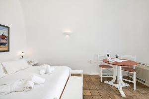 Voodi või voodid majutusasutuse Pantelia Suites toas