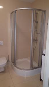Kúpeľňa v ubytovaní Apartament WELLEN + 10 fotografií