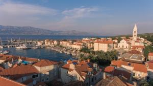 a view of a town with boats in the water at Vila Magdalena in Supetar