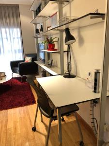 Kuchyň nebo kuchyňský kout v ubytování Espacio Gijón Centro