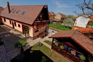 an overhead view of a house with a roof at Vila Ambient in Cristian