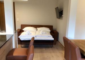 Posteľ alebo postele v izbe v ubytovaní Kitzbuheler Alpen Penthouse Hollersbach