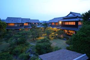 an overhead view of a house with trees and trees at Yoyokaku in Karatsu
