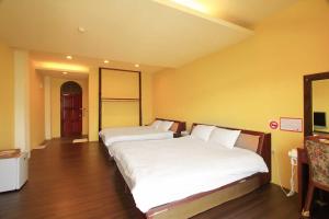 Letto o letti in una camera di Yun Meng Xianjing Homestay