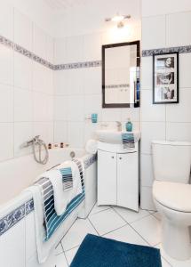Ванная комната в Warsawrent Apartamenty Centralna