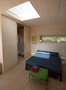 En eller flere senge i et værelse på Eco Bio Agriturismo La Bella Vite - Camere Con Vigna