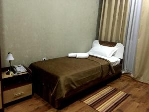 Zarya Hotel客房内的一张或多张床位