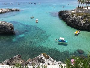 a group of boats in a body of water at Le Strazzigne in Marittima