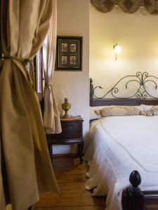 Posteľ alebo postele v izbe v ubytovaní To Archontiko Guesthouse Villa