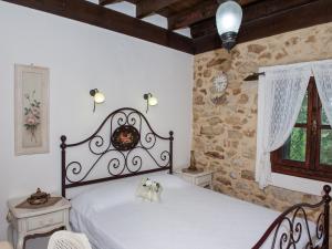 Posteľ alebo postele v izbe v ubytovaní To Archontiko Guesthouse Villa