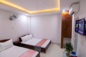 TV a/nebo společenská místnost v ubytování Thế Giang Hotel