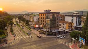 an aerial view of a city with a street at Hotel Union in Podgorica