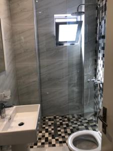 Koupelna v ubytování Hotel EDEA