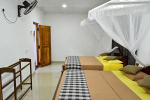 Voodi või voodid majutusasutuse Max Safari Villa toas