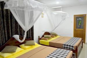 Voodi või voodid majutusasutuse Max Safari Villa toas