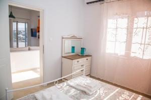 Posteľ alebo postele v izbe v ubytovaní Sunrise Bay