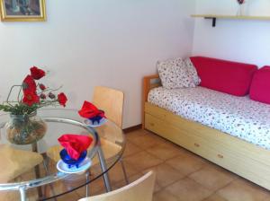 Postel nebo postele na pokoji v ubytování Residence Geranio