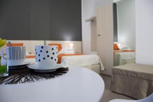 Postel nebo postele na pokoji v ubytování Porta Piccola Residence