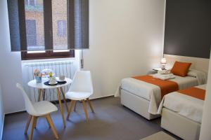 Postel nebo postele na pokoji v ubytování Porta Piccola Residence