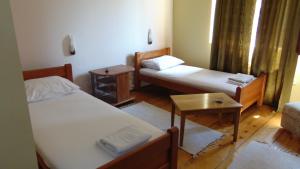 Кровать или кровати в номере Rooms Milin Lagum