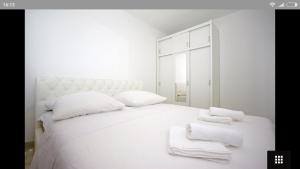 Posteľ alebo postele v izbe v ubytovaní Apartments Marija Max