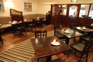 Veitingastaður eða matsölustaður á Dalton Inn Hotel