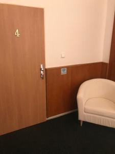 Postel nebo postele na pokoji v ubytování DNM Inn