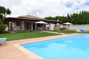 Swimmingpoolen hos eller tæt på Villa Serena Alghero