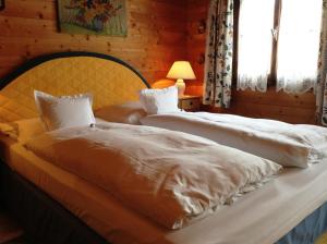 Ein Bett oder Betten in einem Zimmer der Unterkunft Villa Mellon
