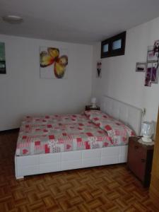 A bed or beds in a room at Casa Marilena