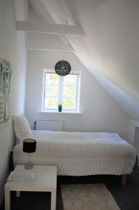 Ein Bett oder Betten in einem Zimmer der Unterkunft Fredensborg Guesthouse