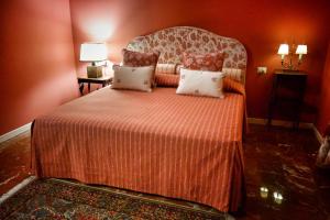 Кровать или кровати в номере Allaportaccanto Bed & Breakfast