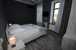 Voodi või voodid majutusasutuse Hotel Terrace Rabath toas