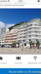 a picture of a large white apartment building at Luxury Apartments Trend in Budva