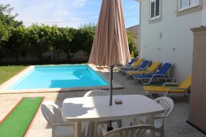 Bazén v ubytování Casa de Vale Benfeito - Turismo Rural nebo v jeho okolí