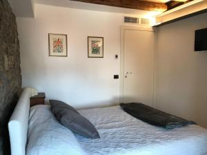 A bed or beds in a room at Casa In Piazza