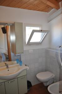 Koupelna v ubytování Hotel Albatros