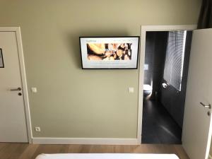 TV a/nebo společenská místnost v ubytování B&B Garden55