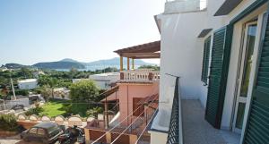 a view from a balcony of a house with a car at da Letizia in Procida