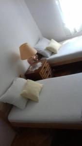 Apartman Vukicaにあるベッド