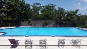 Bazén v ubytování Villas del Carmen Hostal nebo v jeho okolí