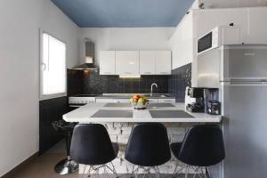 Kuchyň nebo kuchyňský kout v ubytování Diva Apartment
