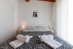 Postel nebo postele na pokoji v ubytování Diva Apartment