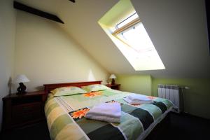 Posteľ alebo postele v izbe v ubytovaní Hotel Spinaker