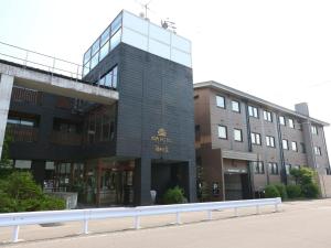 a building on the side of a street at APA Hotel Karuizawa Ekimae Karuizawaso in Karuizawa