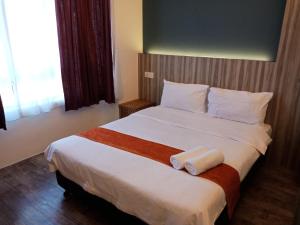 Postel nebo postele na pokoji v ubytování The Verve Hotel PJ Damansara